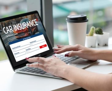 car-insurance-online-website-computer-screen-insure-snugly